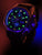 Bracelet de montre pour homme avec chiffres lumineux (vert), bracelet noir, cadran noir