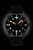 Montre homme avec cadran noir, index luminescents orange et bracelet en cuir