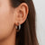 Earrings Titan en argent, sur le lobe de l'oreille, boucle ronde fermée
