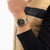 Zweifarbige Herren-Armbanduhr BOSS mit schwarzem Chronographen-Zifferblatt und Metallband