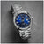 Bulova Herrenarmbanduhr mit blauem Zifferblatt, silbernem Metallband und Zeigern