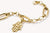 Pendentif Hamsa sur chaîne plaquée or, avec pierres blanches