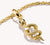 Pendentif serpent en argent plaqué or avec pierre précieuse blanche, à œillet avec chaîne