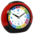 Réveil éducatif pour enfants avec cadran rond et boîtier rouge et noir.