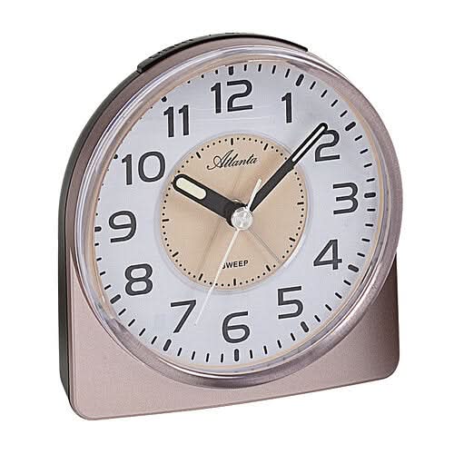 Réveil avec verre rond, cadran clair et boîtier beige