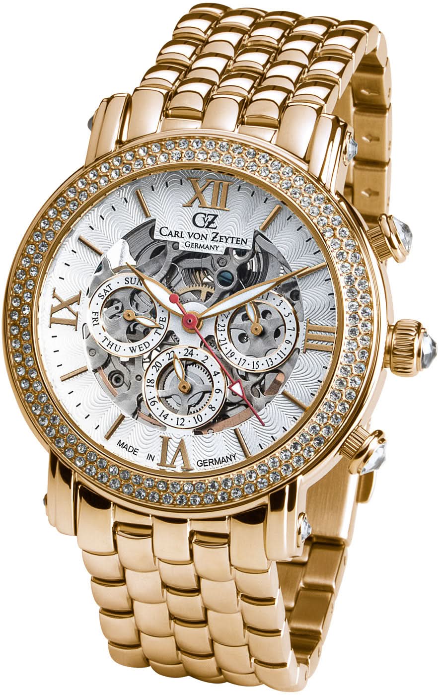 Montre pour femme dorée avec bracelet en métal, lunette scintillante et cadran blanc à mouvement apparent