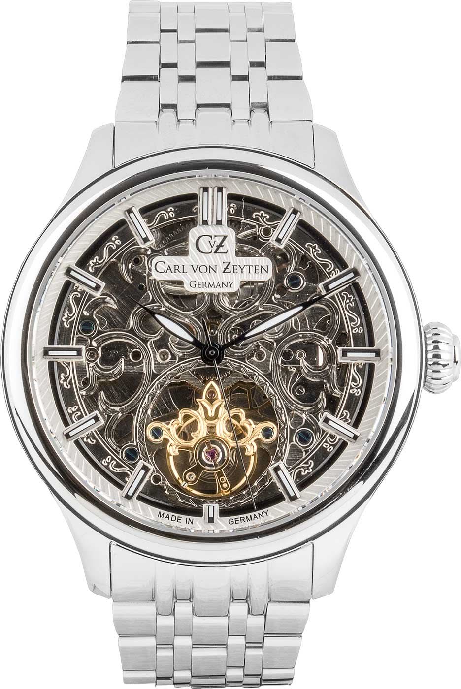 Montre squelette pour homme avec bracelet en métal, cadran argenté et mécanisme doré