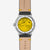 Montre Sternglas Naos avec fond transparent : mouvement doré, bracelet en cuir marron, boîtier en acier inoxydable
