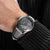 Montre DS9 de Holzkern au poignet : bracelet en cuir perforé gris clair, cadran marbré gris