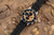 Montre Vostok Europe pour homme avec cadran noir, accents dorés et bordure orange