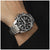 Herrenuhr am Handgelenk mit schwarzem Ziffernblatt und Edelstahlarmband, Chronograph