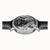 Herrenarmbanduhr mit sichtbarem Uhrwerk, schwarzem Zifferblatt und silbernem Gehäuse