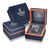 Damenuhr-Set: dunkelblaue Uhrenbox mit roségoldenen Kanten und grauem Polsterkissen