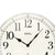 Wanduhr mit großem Zifferblatt, schwarzen Zeigern und AMS-Logo
