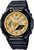 G-Shock Herrenuhr mit schwarzem Gehäuse, goldenem Zifferblatt und schwarzem Armband.