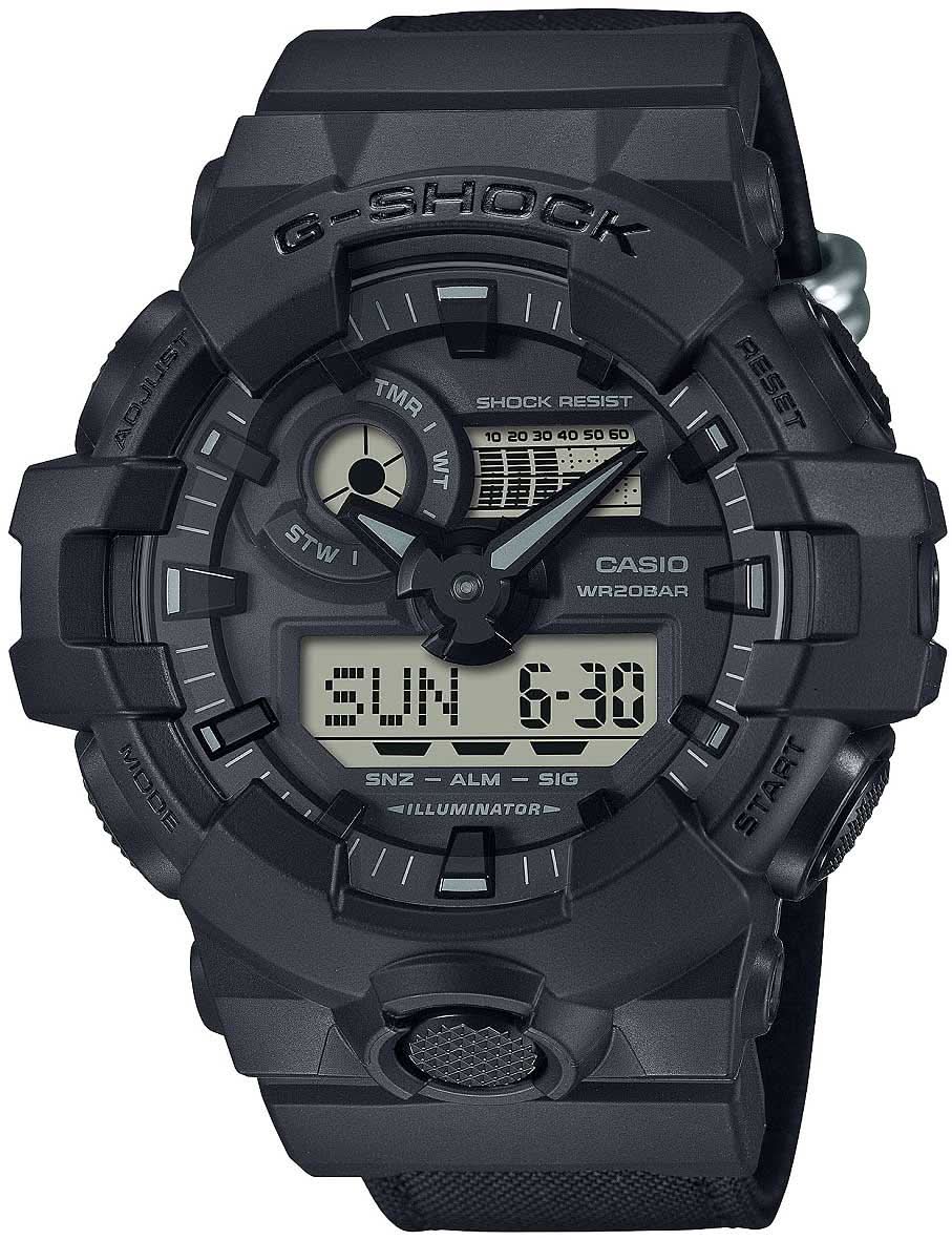 Montre antichoc pour homme, noire, vue de face avec écran numérique et boutons de commande noirs