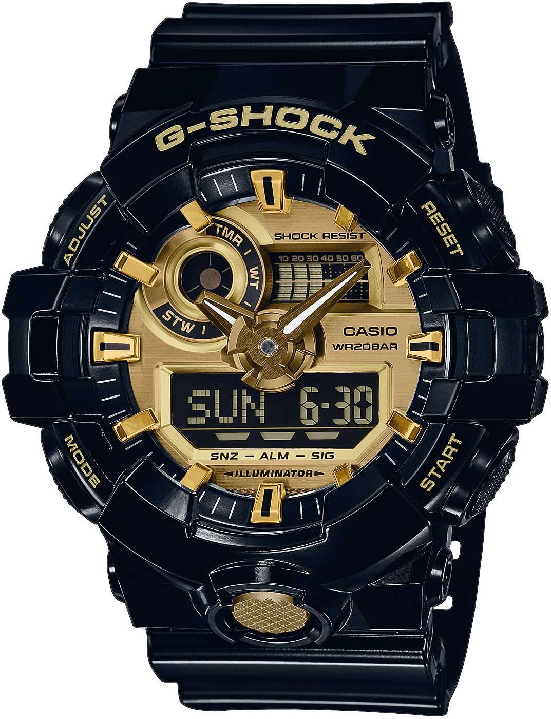 Montre homme avec boîtier noir et bracelet noir, accents dorés, affichage numérique
