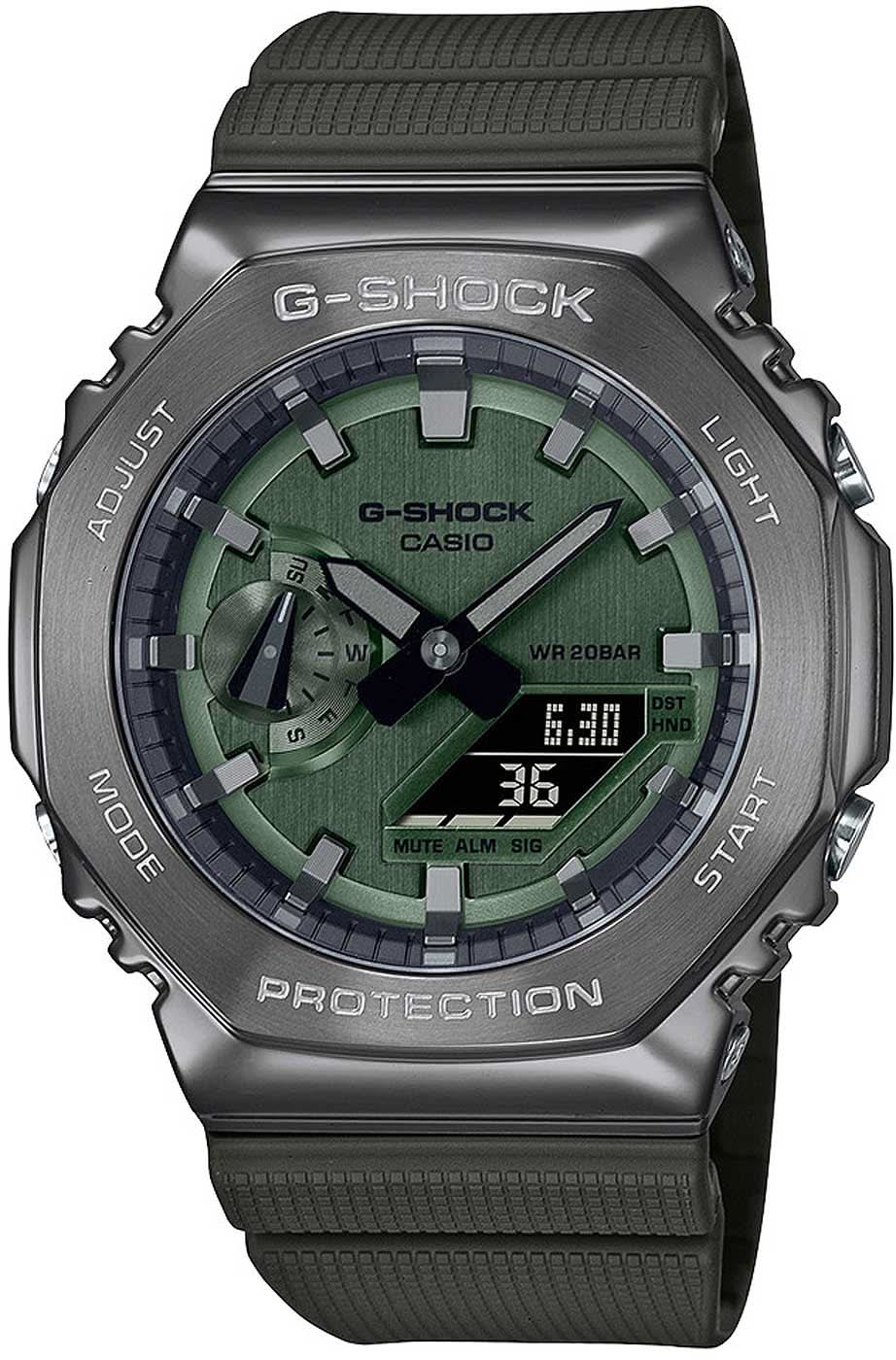 Montre homme avec cadran vert et bracelet en silicone noir, boîtier en métal, affichage numérique.