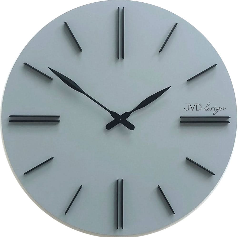 Horloge murale ronde avec cadran clair et index bâtons noirs, design JVD