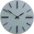 Horloge murale ronde avec cadran clair et index bâtons noirs, design JVD