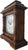 Horloge de table en bois avec façade en verre, cadran et bord latéral incurvé