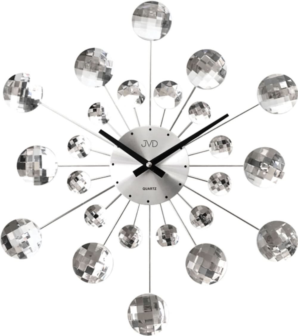 Horloge murale moderne avec cadran rond et inscription quartz, entourée de sphères en verre