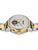 Bicolor-Herrenuhr im Winkel: goldfarbenes Gehäuse, silbernes Band, sichtbare mechanische Details.