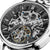 Montre homme avec cadran noir et mouvement automatique visible, boîtier en acier inoxydable