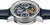 Herrenuhr mit skelettiertem Zifferblatt und blauen Zeigern, sichtbare Zahnräder