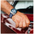 Bulova Chronograph-Uhr mit blau-weiß gestreiftem Silikonarmband und blauem Zifferblatt