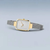 Montre pour femme avec cadran rectangulaire, boîtier plaqué or et bracelet milanais