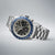 Herrenuhr mit Edelstahlarmband, Chronographen-Zifferblatt und blauer Tachymeter-Lünette