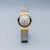 Montre pour femme avec bracelet milanais argenté, boîtier beige et cadran blanc
