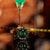 Bracelet pour homme avec cadran vert, bracelet en cuir marron et boîtier argenté