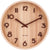 Horloge murale ronde en bois clair avec chiffres et aiguilles noirs