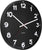 Horloge murale ronde avec cadran noir, chiffres et aiguilles blancs, boîtier en métal