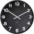Horloge murale ronde avec cadran noir, aiguilles blanches et échelle des minutes sur le bord
