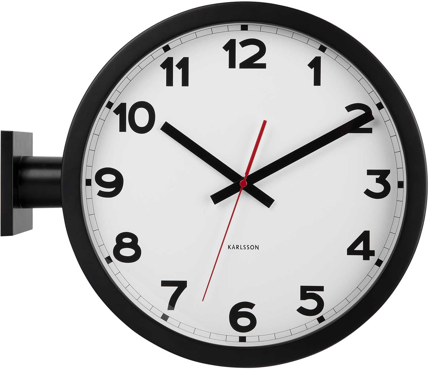 Horloge murale avec cadre noir, cadran blanc et trotteuse rouge.