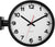 Horloge murale avec cadre noir, cadran blanc et trotteuse rouge.