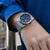 Montre Festina Chrono Bike pour homme au poignet, cadran bleu, bracelet en acier inoxydable argenté