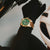 Festina Chrono Bike Herrenuhr mit grünem Zifferblatt, braunem Lederarmband, goldfarbener Lünette