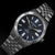 Bracelet de montre pour homme en métal, cadran bleu avec index luminescents et affichage de la date à 3 heures