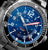 Montre homme Marc and Sons avec cadran bleu, index luminescents et aiguille des secondes rouge.