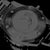 Fond de boîtier d'une montre de plongée avec motif de poisson gravé et surface noire
