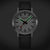 Montre homme avec bracelet en cuir noir, cadran blanc et aiguilles luminescentes vertes