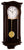Horloge murale en bois avec mouvement à pendule, façade brun foncé, cadran rond avec aiguilles.