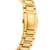 Vue détaillée du bracelet de montre doré avec fermoir et emblème en relief