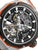 Herrenuhr Detailansicht Skelettzifferblatt mit Zeigern und sichtbaren Zahnrädern, schwarz