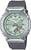Montre pour femme avec cadran vert, boîtier en métal argenté et bracelet noir