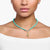 Collier de perles turquoise avec pendentif montgolfière émaillée dorée
